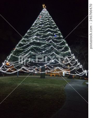 Christmas at Atsugi Air Base: A giant Christmas tree illumination fills the entire screen. Christmas at Atsugi Air Base: A giant Christmas tree illumination fills the entire screen. 140766470