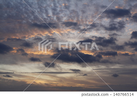 Dramatic red and orange sky and clouds abstract background. Red-orange clouds on sunset sky. Warm weather background. Art picture of sky at dusk Dramatic red and orange sky and clouds abstract background. Red-orange clouds on sunset sky. Warm weather background. Art picture of sky at dusk 140766514