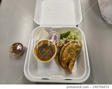 Mexican food: Taco set and soup in takeout containers. Mexican food: Taco set and soup in takeout containers. 140766655