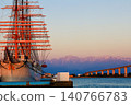A view of the Kaiwo Maru anchored in the setting sun. 140766783