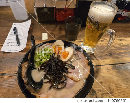 Fukuoka's finest gourmet food: rich tonkotsu ramen and ice-cold draft beer Fukuoka's finest gourmet food: rich tonkotsu ramen and ice-cold draft beer 140766861
