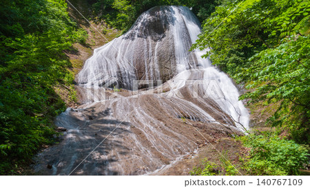 Miroku Falls, surrounded by fresh greenery, in Tago Town, Aomori Prefecture Miroku Falls, surrounded by fresh greenery, in Tago Town, Aomori Prefecture 140767109
