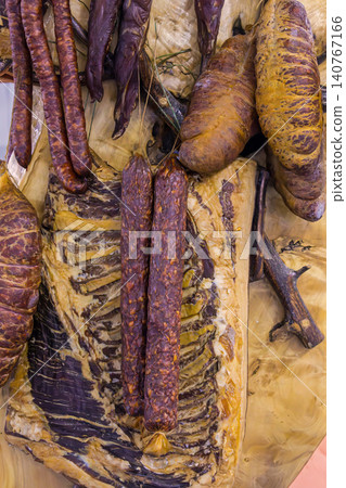 Dry homemade pork meat in smokehouse Dry homemade pork meat in smokehouse 140767166