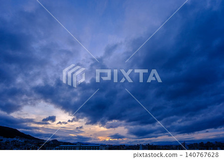 The dawn of the city: From a high floor of an apartment building in Higashinada Ward, Kobe City, at dawn. The dawn of the city: From a high floor of an apartment building in Higashinada Ward, Kobe City, at dawn. 140767628