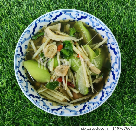 Traditional Thai Bamboo Shoot Soup with Yanang Leaves and Mushrooms in Bowl Traditional Thai Bamboo Shoot Soup with Yanang Leaves and Mushrooms in Bowl 140767664