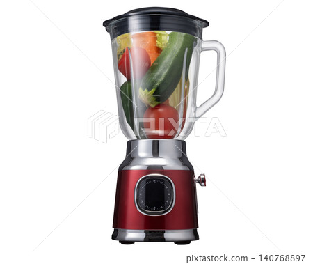 A blender with vegetables inside. A blender with vegetables inside. 140768897