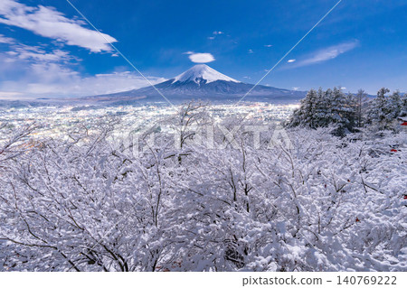 A snowy landscape of Mt. Fuji and the Chureito Pagoda as seen from Arakurayama Sengen Park. A snowy landscape of Mt. Fuji and the Chureito Pagoda as seen from Arakurayama Sengen Park. 140769222