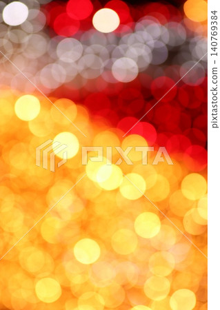 Vertical yellow flame bokeh red silver festive background Vertical yellow flame bokeh red silver festive background 140769384