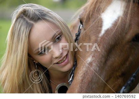riding girl and horse 140769592