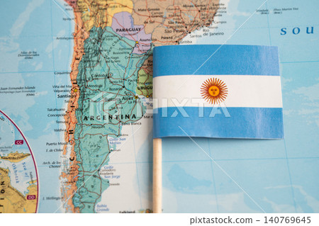 Bangkok, Thailand December 7, 2023, Argentina flag on world map background. Bangkok, Thailand December 7, 2023, Argentina flag on world map background. 140769645