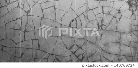 Cracked concrete wall texture with abstract worn plaster pattern and grunge style surface background. 140769724