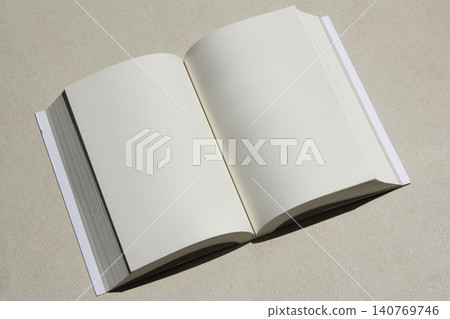 It is a close-up of an open book. It is a close-up of an open book. 140769746