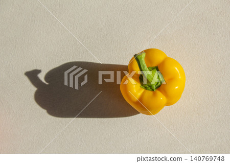 It is a bell pepper placed on a white background. It is a bell pepper placed on a white background. 140769748