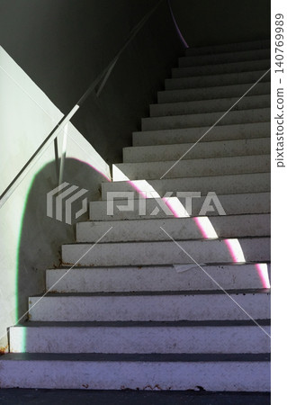 Modern architectural staircase with a circular entrance Modern architectural staircase with a circular entrance 140769989