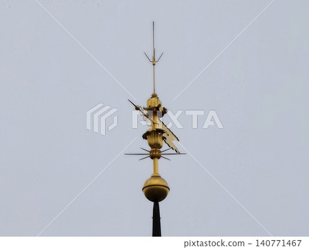Highly detailed gilded finial showcasing fine craftsmanship and aesthetic excellence in design Highly detailed gilded finial showcasing fine craftsmanship and aesthetic excellence in design 140771467