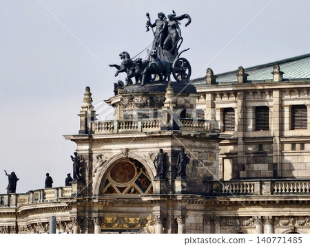 Artistic silhouette displays victorious chariot with majestic elegance opposite cloudy sky Artistic silhouette displays victorious chariot with majestic elegance opposite cloudy sky 140771485