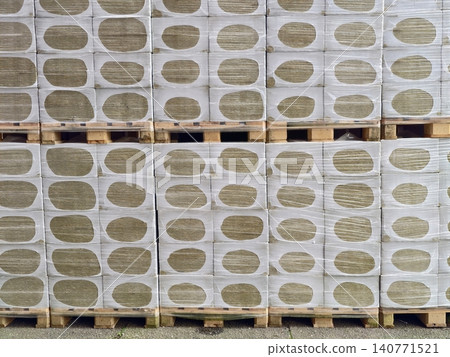 Largescale storage units stacked systematically on pallets prepared for timely delivery and distribution Largescale storage units stacked systematically on pallets prepared for timely delivery and distribution 140771521