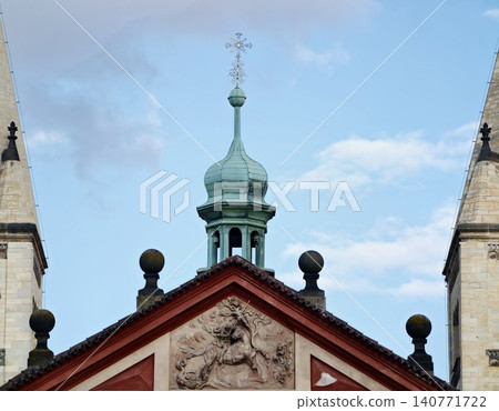 Heritageinspired classical building features. Distinctive triangular gable with sculpted ornaments Heritageinspired classical building features. Distinctive triangular gable with sculpted ornaments 140771722