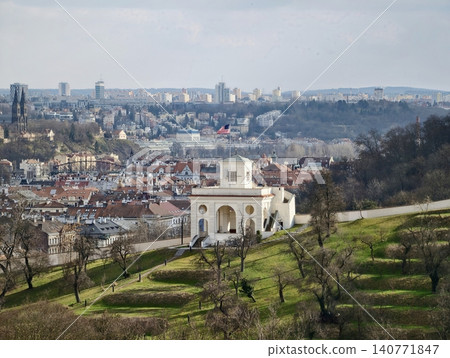 Chapel overlooks gardens. Peaceful hilltop chapel encircled by landscaped gardens and city views Chapel overlooks gardens. Peaceful hilltop chapel encircled by landscaped gardens and city views 140771847