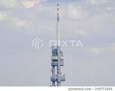 Cityscape features communication antennas. Urban skyline dotted with multiple relay towers Cityscape features communication antennas. Urban skyline dotted with multiple relay towers 140771850