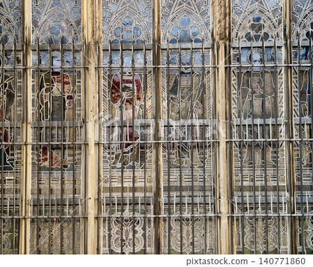 Decorative ironwork detail. Heritage restoration reveals craftsmanship and textured architectural features Decorative ironwork detail. Heritage restoration reveals craftsmanship and textured architectural features 140771860