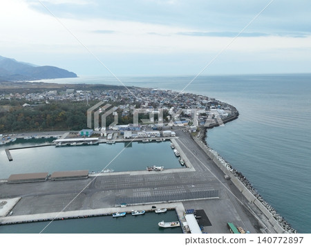 <Bird's-eye view> Aerial view of Mashike town and its fishing port. <Bird's-eye view> Aerial view of Mashike town and its fishing port. 140772897