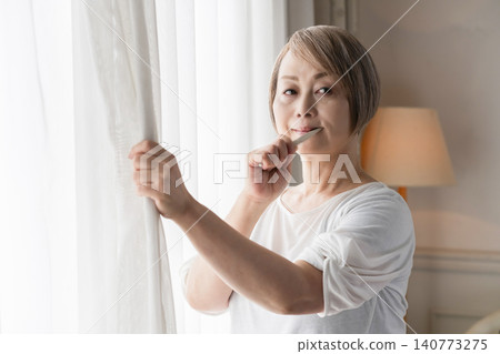 Senior woman brushing teeth Senior woman brushing teeth 140773275