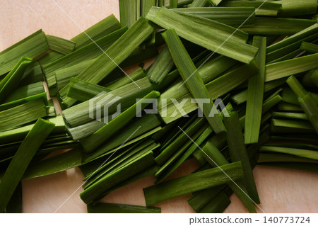 Chives cut on a cutting board Chives cut on a cutting board 140773724