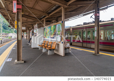 A view of the platform at Takao Station on the Keio Line in Tokyo; transferring to the Chuo Line. A view of the platform at Takao Station on the Keio Line in Tokyo; transferring to the Chuo Line. 140774015