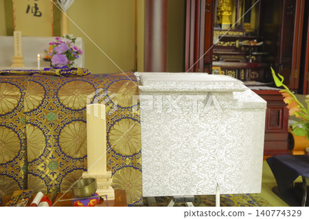 A white coffin placed in front of the altar in the Japanese-style room. A white coffin placed in front of the altar in the Japanese-style room. 140774329