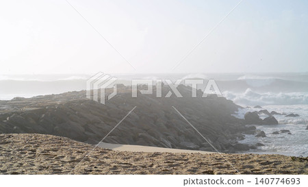 The sea rises to the seafront of Furadouro in Ovar The sea rises to the seafront of Furadouro in Ovar 140774693