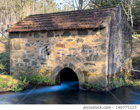 Old Stone Watermill at Parque de Lazer da Varzea in Portugal Old Stone Watermill at Parque de Lazer da Varzea in Portugal 140775123
