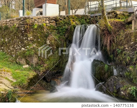Cascata do Chouso Waterfall Flowing Over Rocks in Portugal Cascata do Chouso Waterfall Flowing Over Rocks in Portugal 140775138