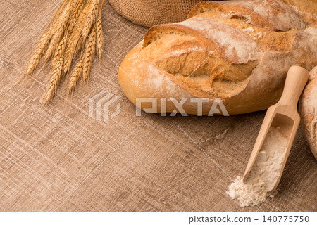 Rustic bread and wheat Rustic bread and wheat 140775750