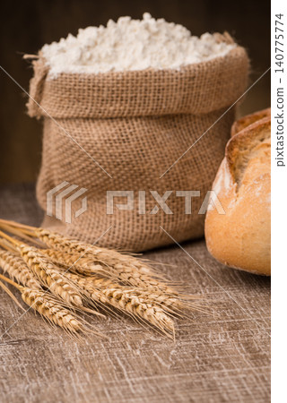 Rustic bread and wheat Rustic bread and wheat 140775774