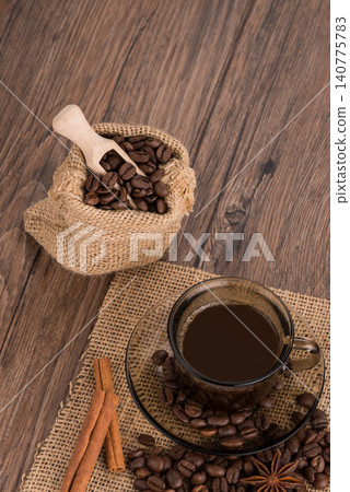 Coffee cup with burlap sack Coffee cup with burlap sack 140775783