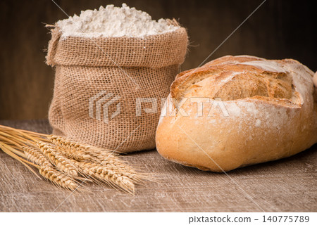 Rustic bread and wheat Rustic bread and wheat 140775789