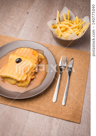 Francesinha and french fries Francesinha and french fries 140775840