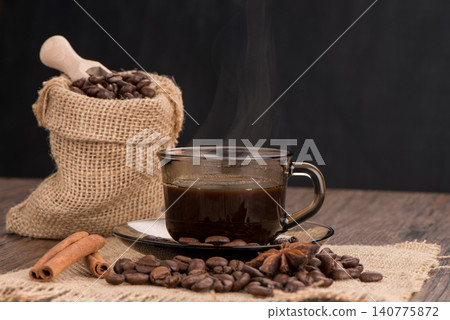 Coffee cup with burlap sack Coffee cup with burlap sack 140775872