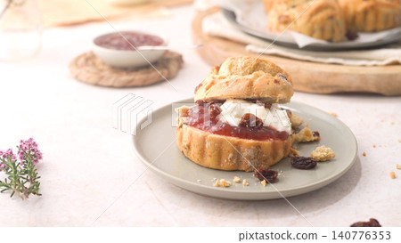 Scones with Strawberry Jam and Clotted Cream Scones with Strawberry Jam and Clotted Cream 140776353