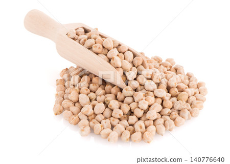Uncooked chickpeas and wooden scoop Uncooked chickpeas and wooden scoop 140776640