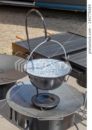 Cauldron with handle outside Cauldron with handle outside 140776884