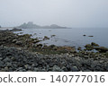 Enveloped in a mystical mist and flocks of seagulls, the Kabushima Shrine and its intricate rocky shores are a sight to behold in early summer. 140777016