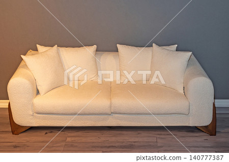 Comfortable sofa with pillows Comfortable sofa with pillows 140777387