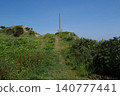 The remains of the milepost in Hachinohe, which measured the speed of ships, stand tall against the blue sky. 140777441