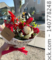A woman's hand holding a bouquet of flowers in Los Angeles 140778248