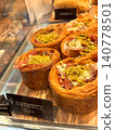 Delicious-looking Gorgonzola tarts lined up in a store in Hawaii 140778501
