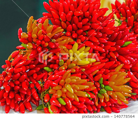 Bunch of hot peppers on market 140778564