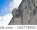 Chichen itza ball court stone ring against sky 140778992