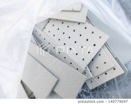 Soffit scraps, calcium silicate board, industrial waste, construction waste Soffit scraps, calcium silicate board, industrial waste, construction waste 140779047